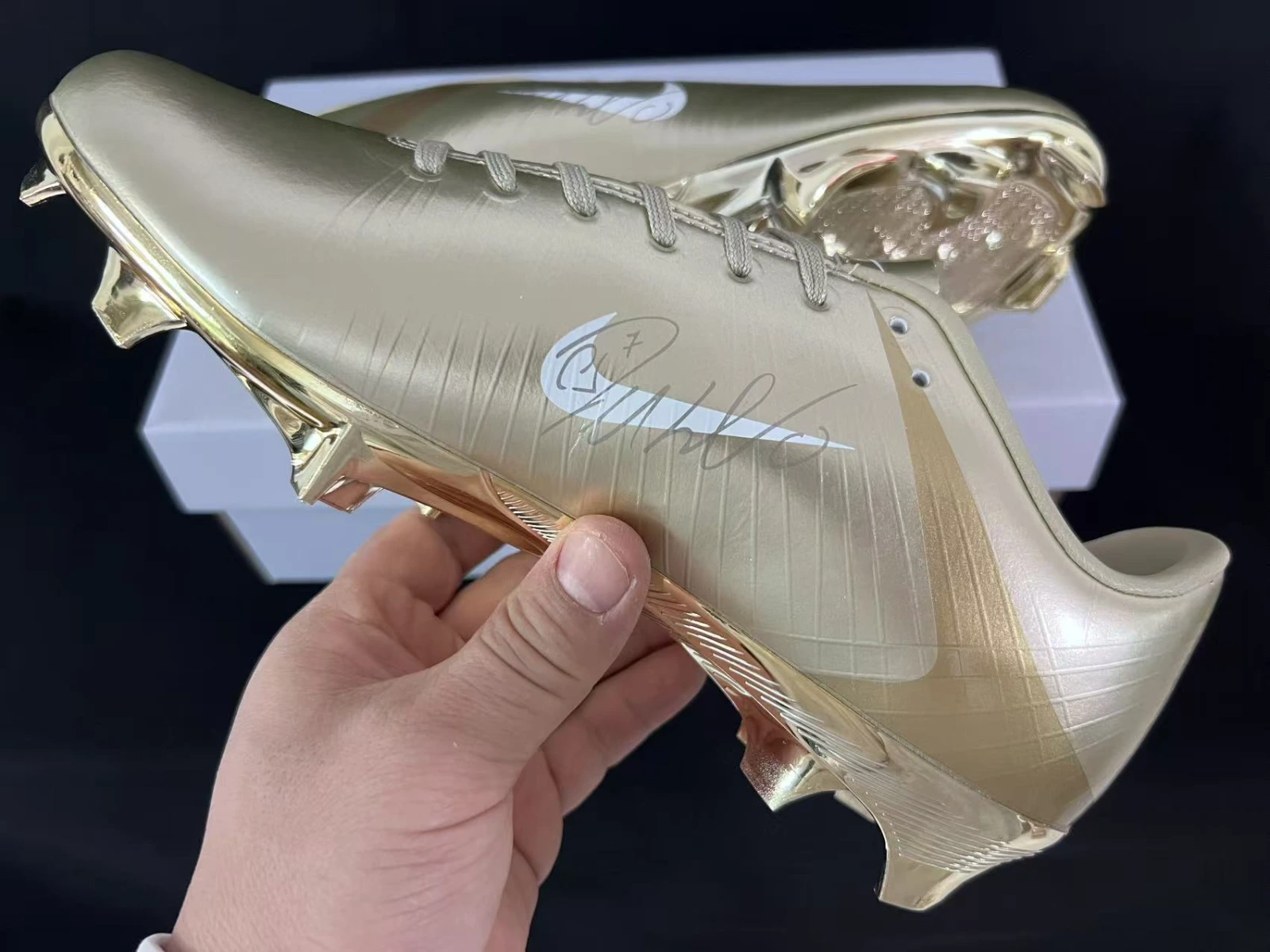 the CR7 Mercurial heel logo and metallic chrome soleplate